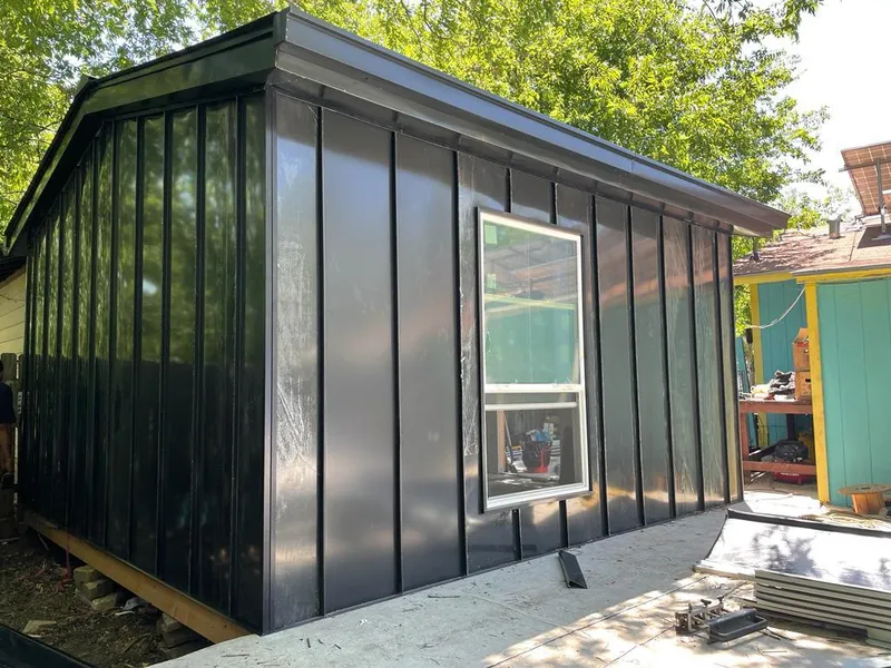 Black standing seam metal wall panels for Roof Inspection in Oberlin